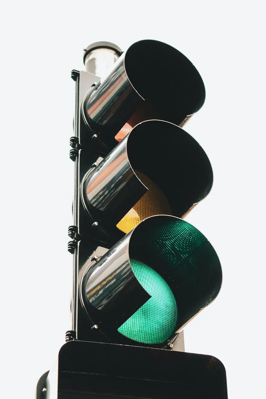 black traffic light displaying green light and number 13